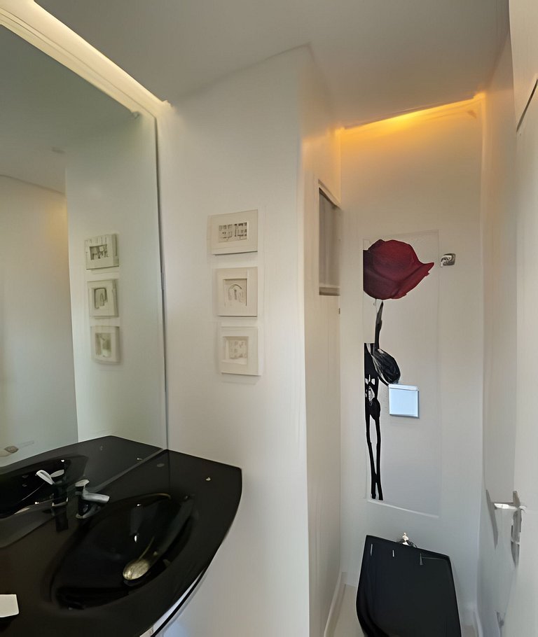 Apartamento frente mar com churrasqueira.
