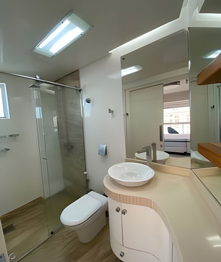 Apartamento frente mar com churrasqueira.